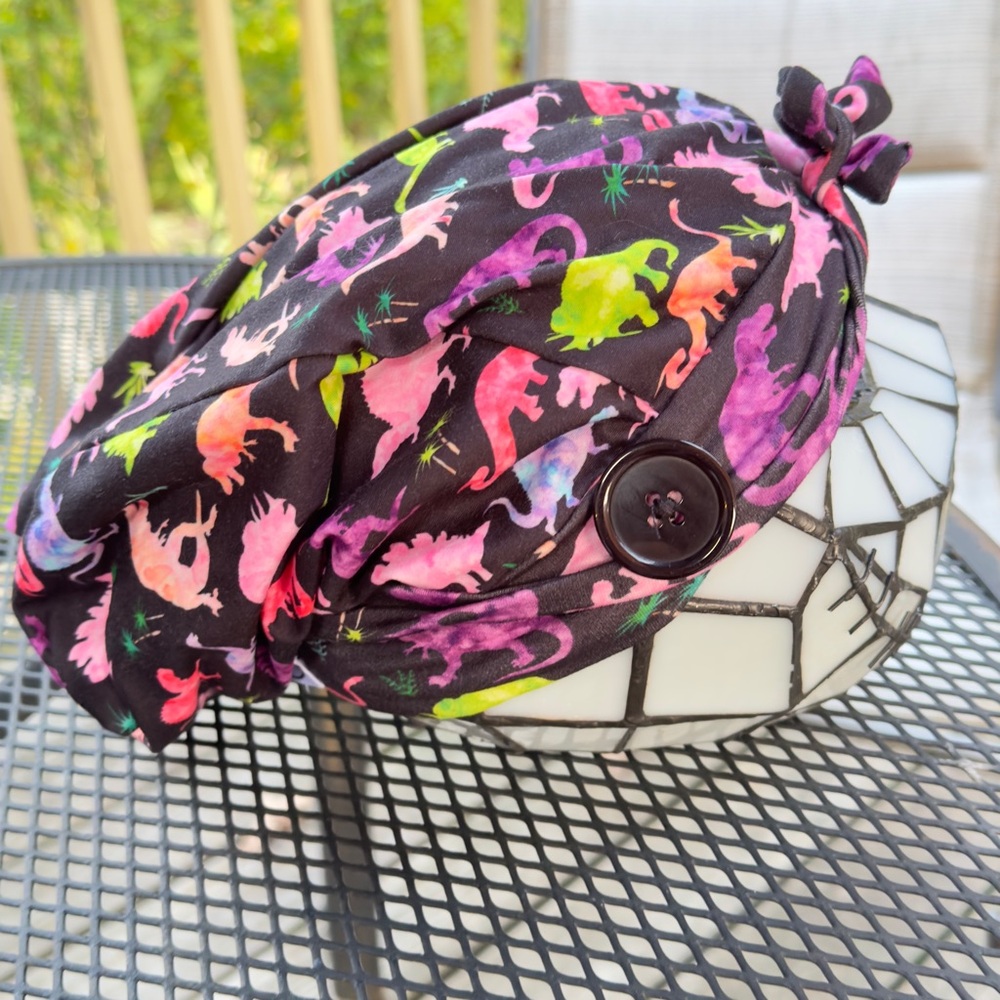 Scrub cap buttons and tied from back - With dinosaurs